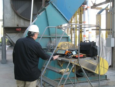 Performing field balancing and bearing analysis on a 200 HP baghouse fan.
