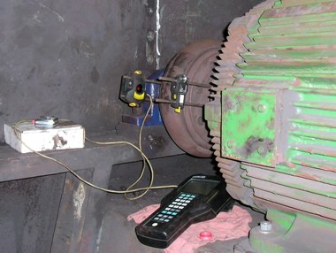 Laser aligning a 250 HP motor and Dodge ParaFlex coupling on a 60" diameter BC type fan.